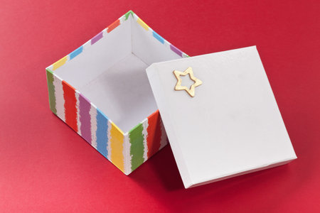 Gift Box with star on red background