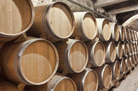Valladolid, Spain, July 9th, 2011. Inside a winery in Ribera del Duero, with wine barrels stackedのeditorial素材
