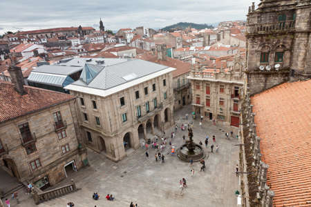 Santiago de Compostela, Spain - August 4, 2012: Plaza de Las Plater?, attached to the south side of the Cathedral, with the power of the horses work of J. Pernas in 1825. There are people walking.のeditorial素材