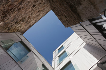 Santiago de Compostela, Spain - August 5, 2012: Between perspective walls of stone buildings