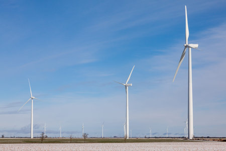 wind mills in snow field