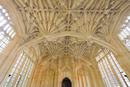 Oxford, England - May 15, 2016; vaulted medieval interior of the Divinity School at the University of Oxfordのeditorial素材