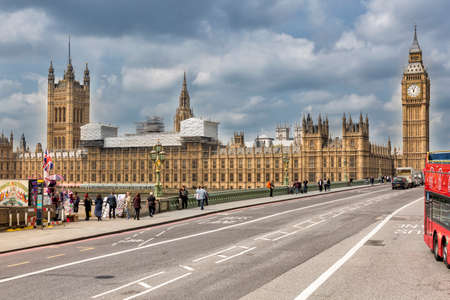 London, UK - May 16, 2016. Westminster Bridge to the Houses of Parliament and Big Ben. There are people walkingのeditorial素材