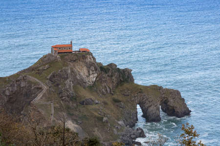 Islet of San Juan de Gaztelugatxe, linked to the coast of the Basque Country by a bridge with archesのeditorial素材