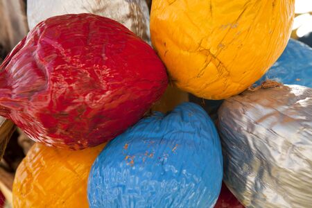 Coconuts painted different colors for the Christmas holiday season. Vacation and travel theme for the hoildays.の写真素材