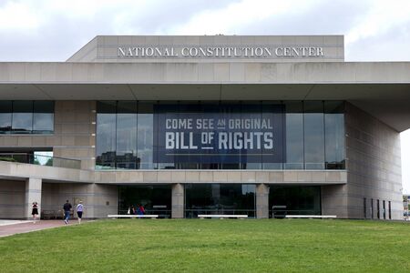 Tourist sightseeing at National Constitution Center located on Independance mall in Philadelphia Pennsylvania where they can see the original "Bill of Rights"のeditorial素材