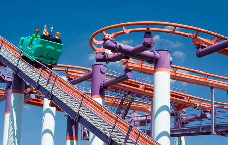 Modern single car roller-coaster climbing track at amusement park in Minnesotaのeditorial素材