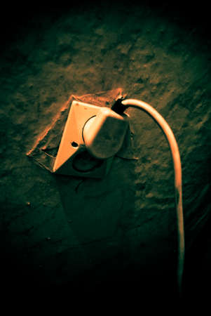 Picture presents old rusty electrical outletの写真素材