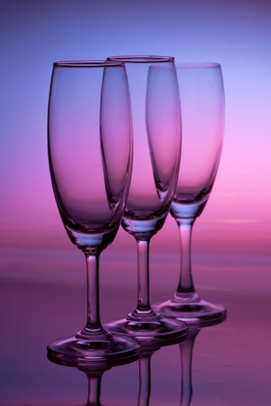 Champagne glass with rainbowの写真素材