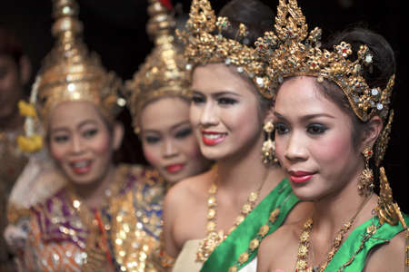 Beautiful lady dancing for original Thai dance with golden costume.のeditorial素材