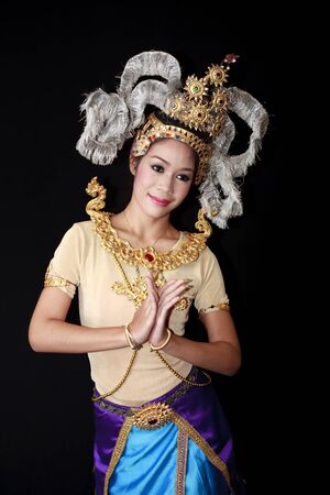 Beautiful lady dancing for original Thai dance with golden costume.のeditorial素材