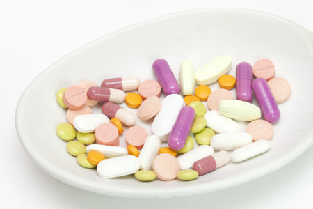 Drugs many type (capsule and tablet) with isolate background.