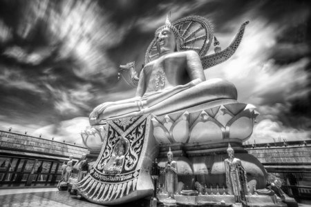 Big Buddha in Wat Phra Yai Temple, Koh Samui island, black and white color, Thailand 