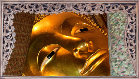 Face of goldent big buddha in the wooded picture frame. Wat prakeaw, collection of best travel place...