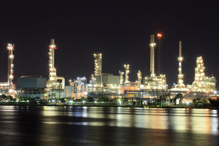 Landscape of river and oil refinery factory between sun rise time in Chao praya river, Bangkok,...
