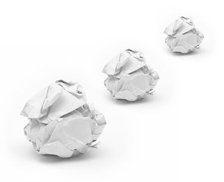 close-up of crumpled paper ball with white background の写真素材