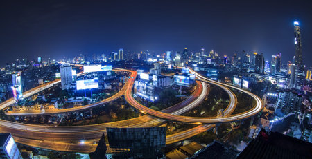 Bangkok city night view with main traffic high way.
