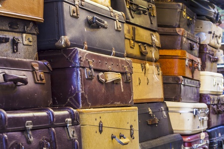 Pile of old vintage bag suitcases の写真素材