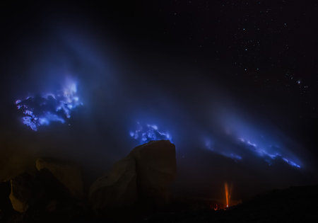 the blue fire a flow of liquid sulfur which has caught fire and burns with an blue flame  Cater of...