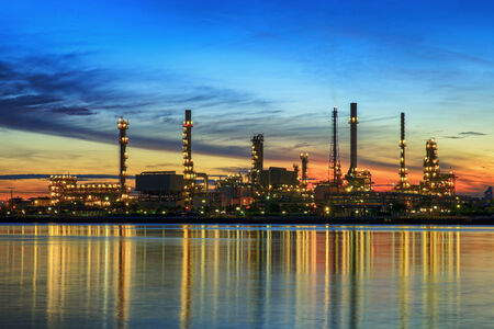 petrochemical plant in night time with reflection over the riverのeditorial素材