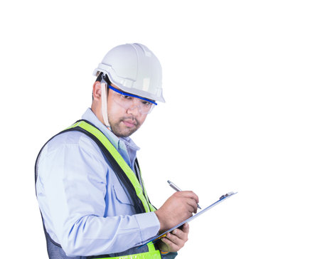 Asian Engineer Writing On Clipboard On white isolated background with clipping part.