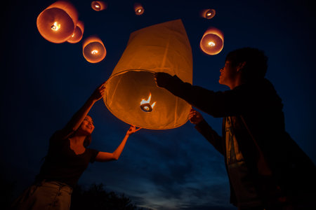 Thai people floating lamp in Tudongkasatarn, Chiangmai, Thailand. Tudongkasatarn is where floating lamp ceremony takes place every year.のeditorial素材
