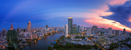 Landscape of River in Bangkok city in night time with bird viewの写真素材