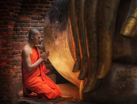 Buddhism Monk sit in the Temple in Thailand.の写真素材