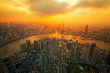 aerial view of shanghai at night from jinmao building, best point roof top view in Shanghai city, China with sunsetの写真素材
