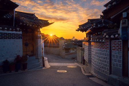 The old town, Korean home in Seoul city with morning sunrise in Koreaの写真素材