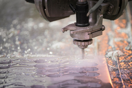 Hydroabrasive treatment. Metalworking cutting with water jetの写真素材