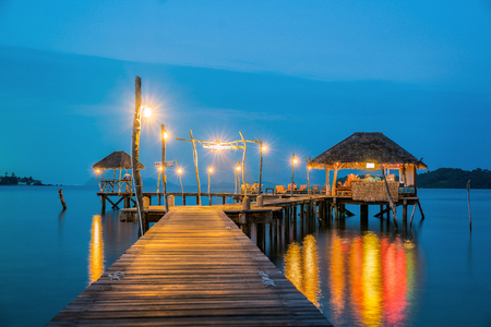 Wooded bridge to Koh Mak harbor after sunset, Koh Mak and Koh Kood is island in Thailand, This photo can use for Relax, Holiday, Asia, travel, Beach and Summer conceptの写真素材