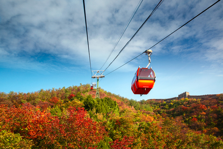 Cable car to top of the great wall and autumn mountain in Beijing city, China, Asia, this photo can use for travel and transportation in Chinaの写真素材