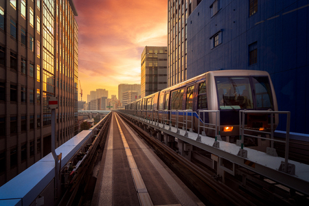 Train in city in Tokyo with sunset background, Tokyo, Japan. This immage can use for Transportation and travel concept in the cityの写真素材