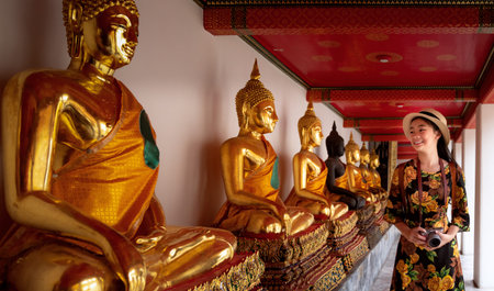 Asian lady travel in Wat Pho temple and grand palace in Bangkok city, Thailand