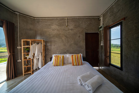 Modern Bed room in home stay in Pua, Nan, Thailand, this image can use for travel, hotel, tour, and...