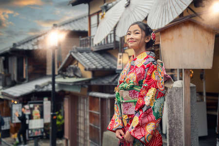 Asian woman wearing japanese traditional kimono at Yasaka Pagoda and Sannen Zaka Street in Kyoto, Japan.の写真素材