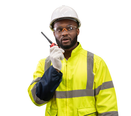 industrial worker is controlling container loading by walkie talkie in import export business. isolated on white background.の写真素材