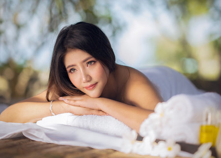 Asian woman relax with body spa in resort in Bangkok, Thailandの写真素材