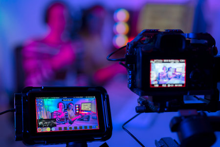 Asian streamer make video streaming for game play and gaming by video maker device and online to website in an internetの写真素材