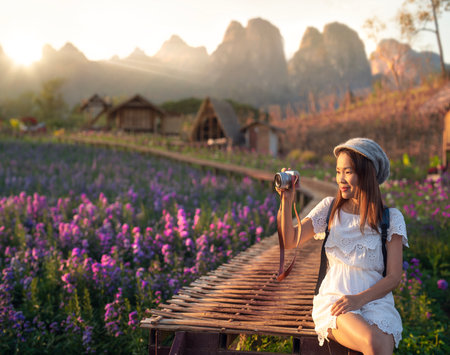 Flower in garden at Phu pha muak with asian woman traveller on Doi Inthanon mountain national park, Chiang mai, Chiang dap, Thailand on winter time about December to Januaryの写真素材