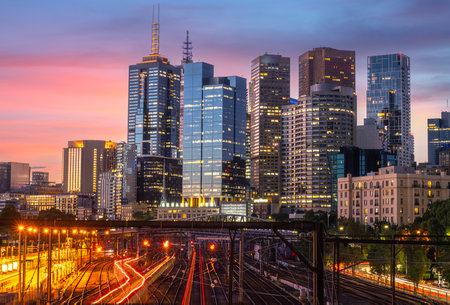 Melbourne railway station, melbourne city and train station in Australia with sunset sky background and building in the cityの写真素材