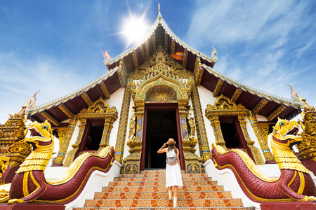 Asian traveller take a photo to Pagoda of wat lok moli temple in Chiang mai city, Thailandの写真素材
