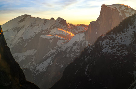 panorama photo of yosemite national park view with waterfall and sunset, yosemite valley, USAの写真素材