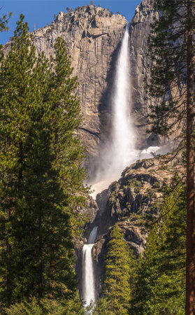 panorama photo of yosemite national park view with waterfall and sunset, yosemite valley, USAの写真素材