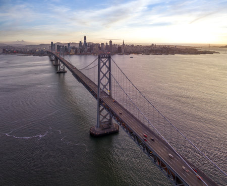 Cityscape view of San Francisco and the Bay Bridge with Colorful Sunset from island, California, USAの写真素材