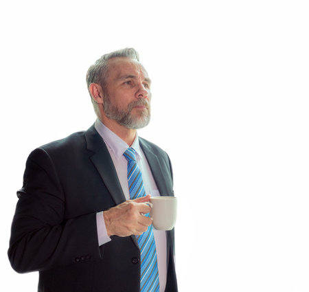 old man manager relax with coffee break with white isolated backgroundの写真素材