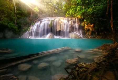 Level two of erawan waterfall in kanchanaburi with blue water and green tree, Best travel point near Bangkok, Thailandの写真素材