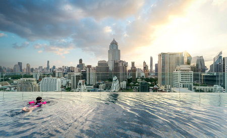 swimming pool and roof top bar on hotel deck in Bangkok city, Thailand on 6Aug2020