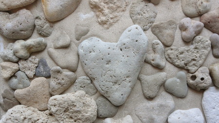 Many heart stones on the beachの写真素材